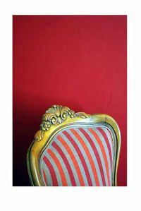 Dans son fauteuil Voltaire